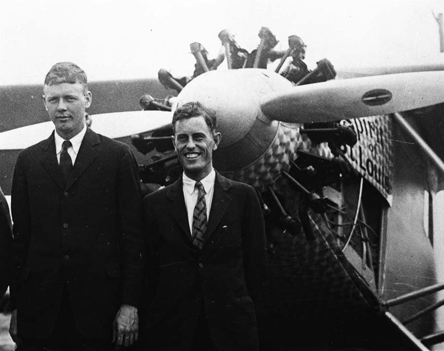 Charles Lindbergh and Chief Engineer Donald A. Hall Sr. standing together in front of the Spirit of St. Louis.
