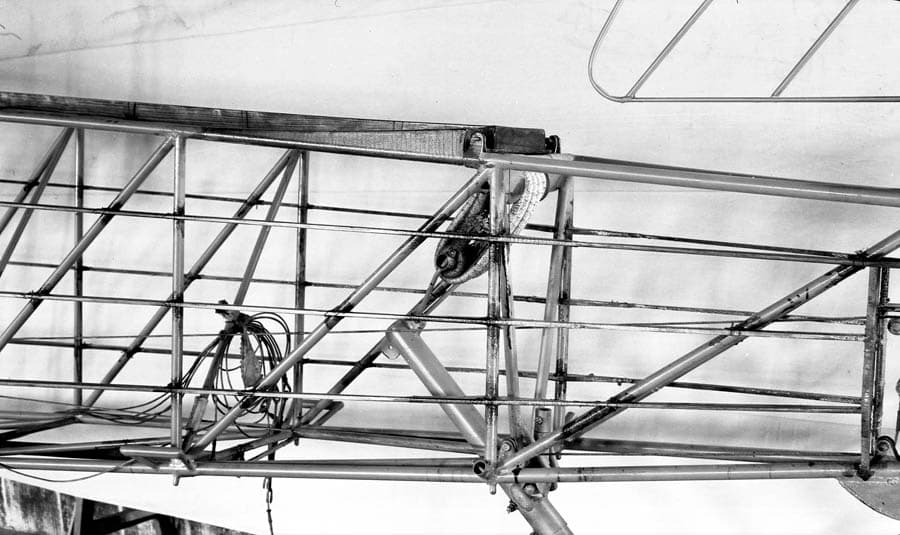 A close-up view of the Spirit of St. Louis tail skid mechanism, utilizing wrapped industrial-grade bungee cord for shock absorption.