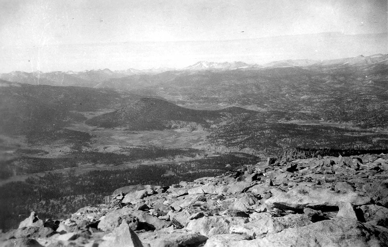 A wide panoramic-style view of overlapping mountain ranges.
