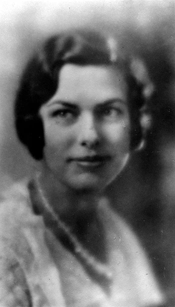 Soft-focus vintage studio glamour portrait bust of Elisabeth Hall with finger-waved hair.