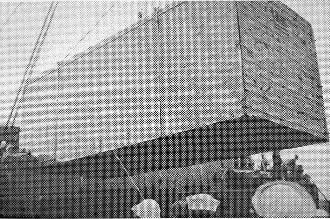 Upward angle of the massive wooden crate enclosing the Spirit of St. Louis suspended from ship crane cables.