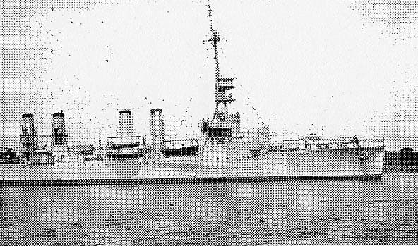 Detailed starboard broadside view of the cruiser USS Memphis at anchor showing bridge and funnels.