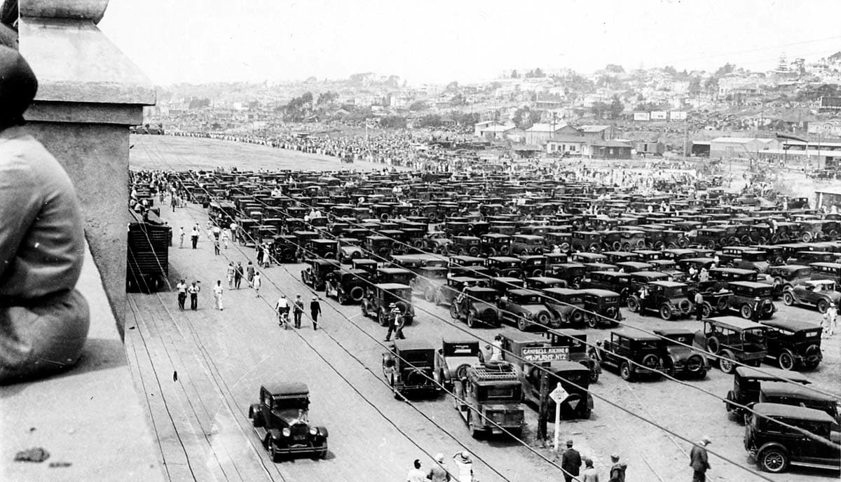 From the roof of Ryan Airlines with a mass of cars parking along Market St in San Diego. The engineers and employees on the roof enjoying the show.