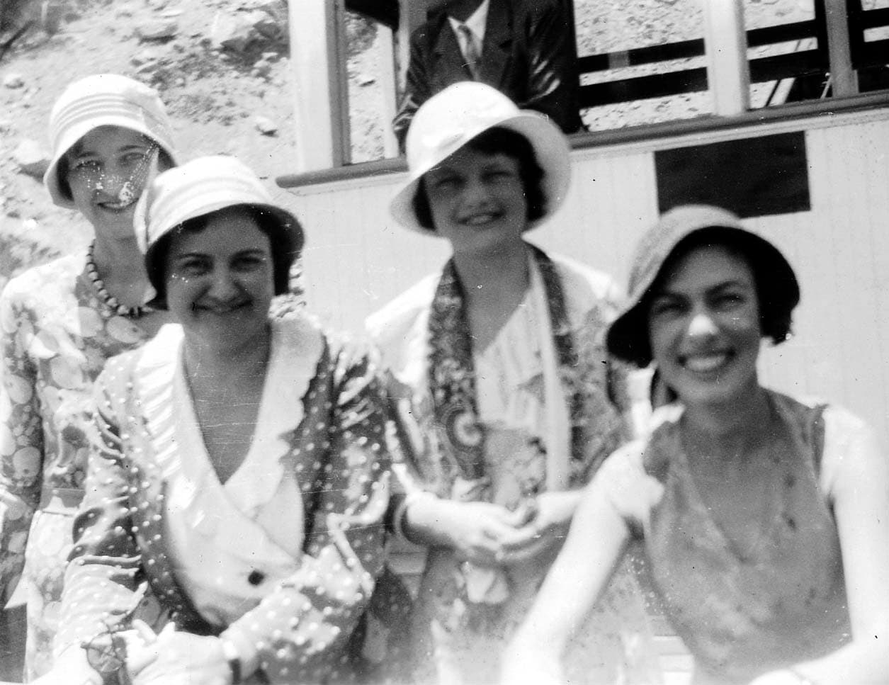 Four women in San Diego on a chaperoned date with vintage hats and clothes