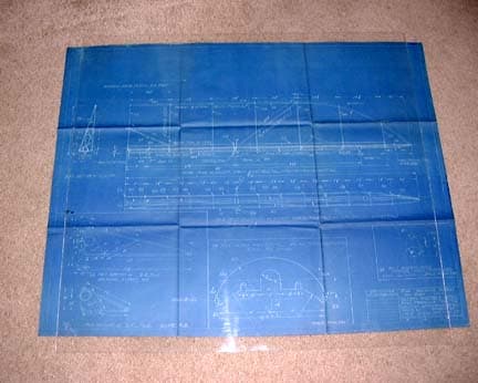 Original blueprint detailing the welded tubular steel fuselage side elevation and structural Warren truss layout of the Ryan M-2.
