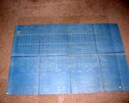 Blue-line blueprint detailing the internal wooden rib structure, spruce box spars, and fuel tank bays of the Ryan NYP wing.