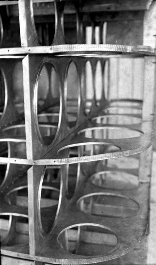 A close-up view of the internal terneplate soft metal baffles and structural rings inside the massive fuel tank of the Spirit of St. Louis.