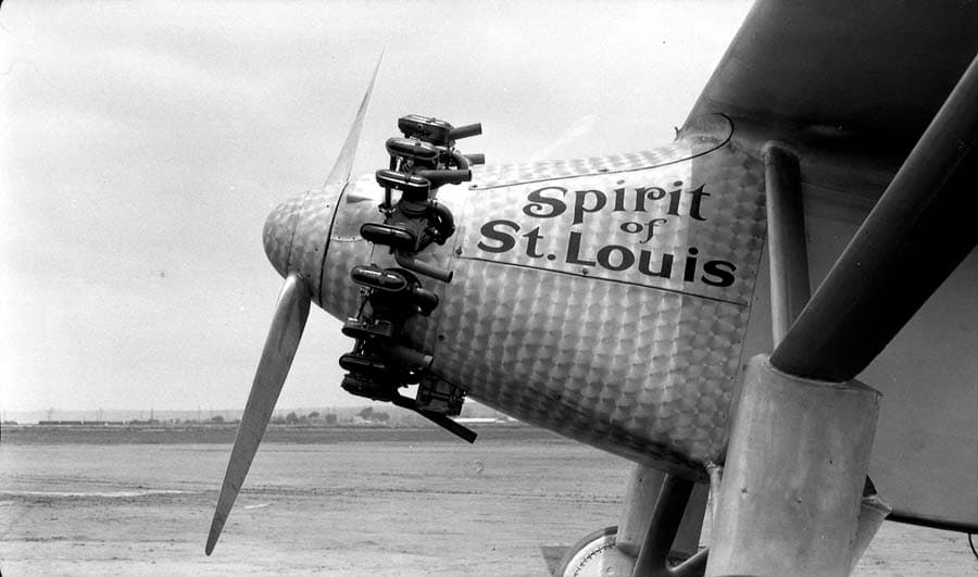Close-up photograph of the Spirit of St. Louis damascened nose cowl, Wright Whirlwind engine, and propeller.