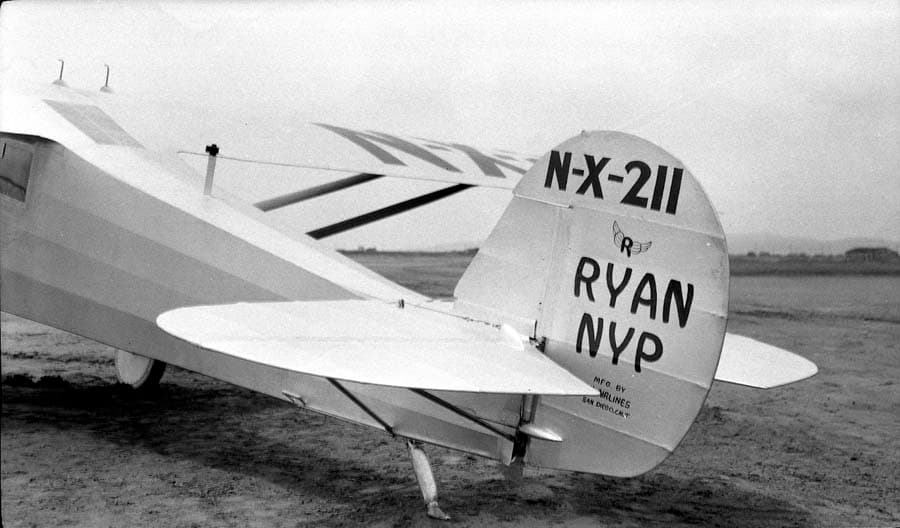 Broad perspective of the Spirit of St. Louis empennage showing rudder, elevators, and upper wing registration.