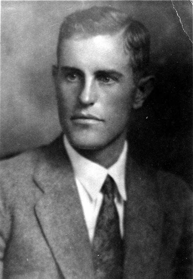 Studio portrait bust of Donald A. Hall Sr. in a tweed suit jacket and necktie as a young engineer.