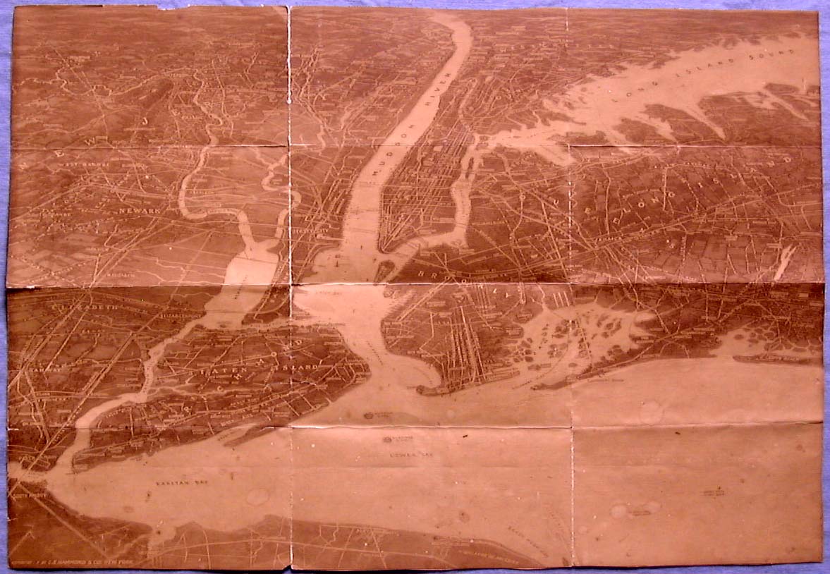 A vintage folding sepia lithographic bird's-eye map of New York City, Manhattan, and Long Island Sound by C.S. Hammond & Co.