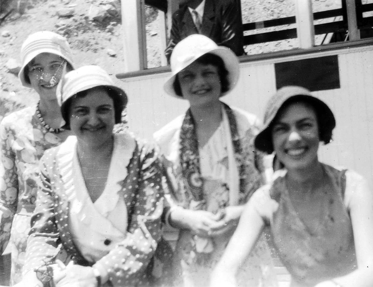 Four women in San Diego on a chaperoned date with vintage hats and clothes