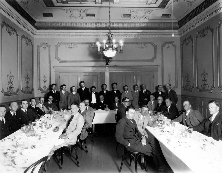 Banquet photograph of Charles Lindbergh, Donald Hall, B.F. Mahoney, dignitaries, and the Ryan Airlines team celebrating flight trials in 1927.