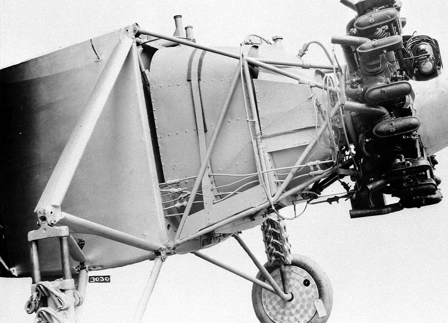 Technical engineering photograph by H.A. Erickson showing the bare Spirit fuselage frame, fuel tank, and Wright Whirlwind engine.