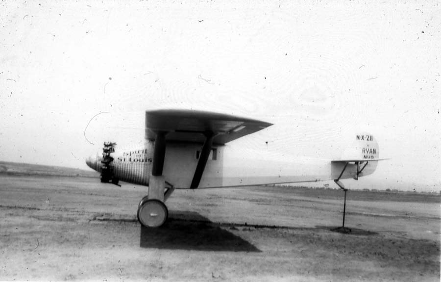 Left side profile view of the Spirit of St. Louis on tail trestle during weight-and-balance center-of-gravity tests.