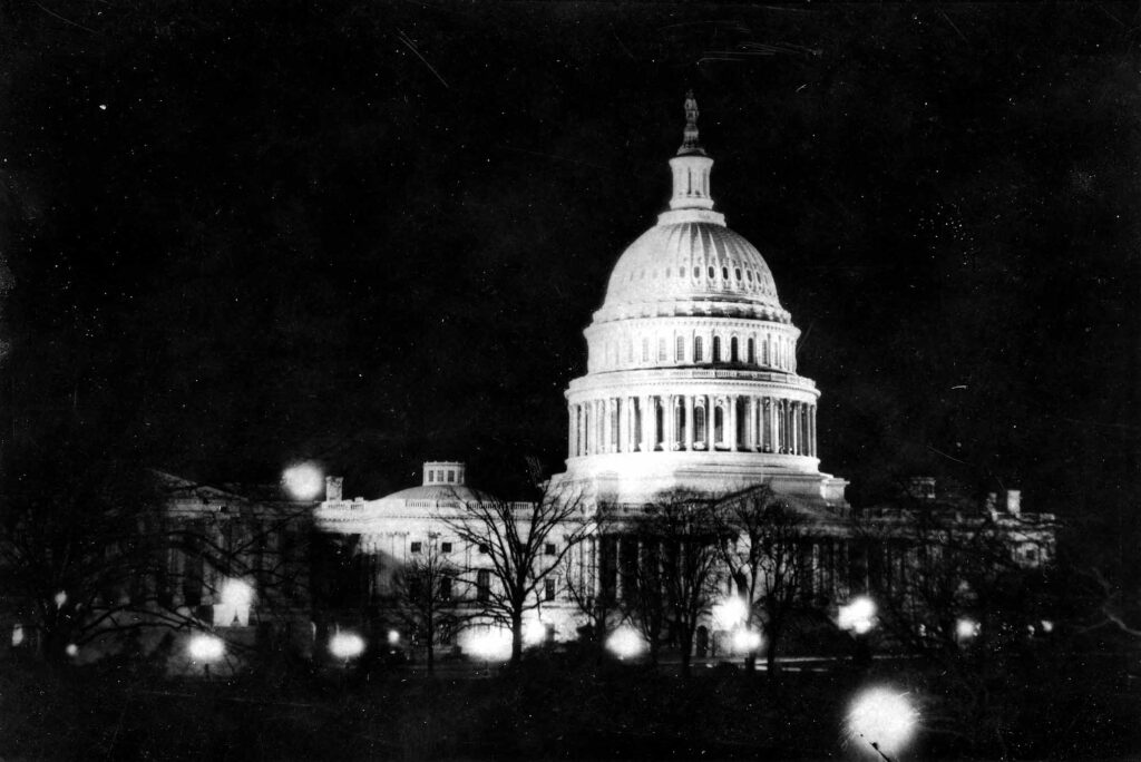 Vintage Black and White photograph of the nations Capital Building at night in Washington, D.C. Photo taken by Donald Hall in 1927 after the Spirit of St. Louis and Charles Lindbergh arrived from England.