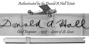 Trademark for the Donald A. Hall Estate collection including the signature of the engineer Donald Hall, a blueprint front view of the Spirit of St Louis, and the slide rule that was used to design the airplane in 1927.