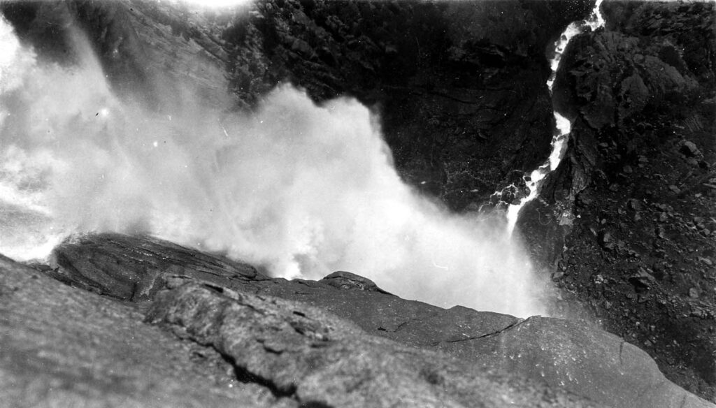 Vintage black and white photograph of an waterfall looking down. Taken at Yosemite National Monument, California.