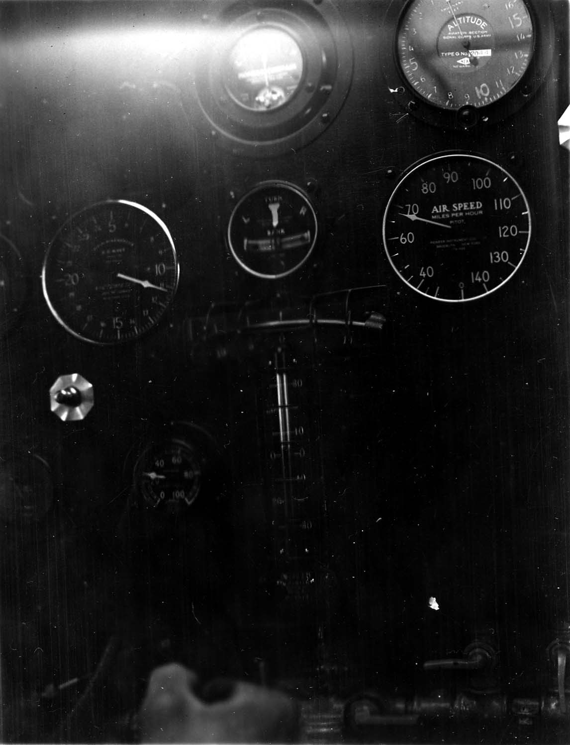 Vintage photograph from 1927 of the Spirit of St. Louis aircraft showing Pilot, Charles Lindbergh flying and holding control stick. Photo by Donald Hall, Chief Engineer in the sky, over San Diego, California.