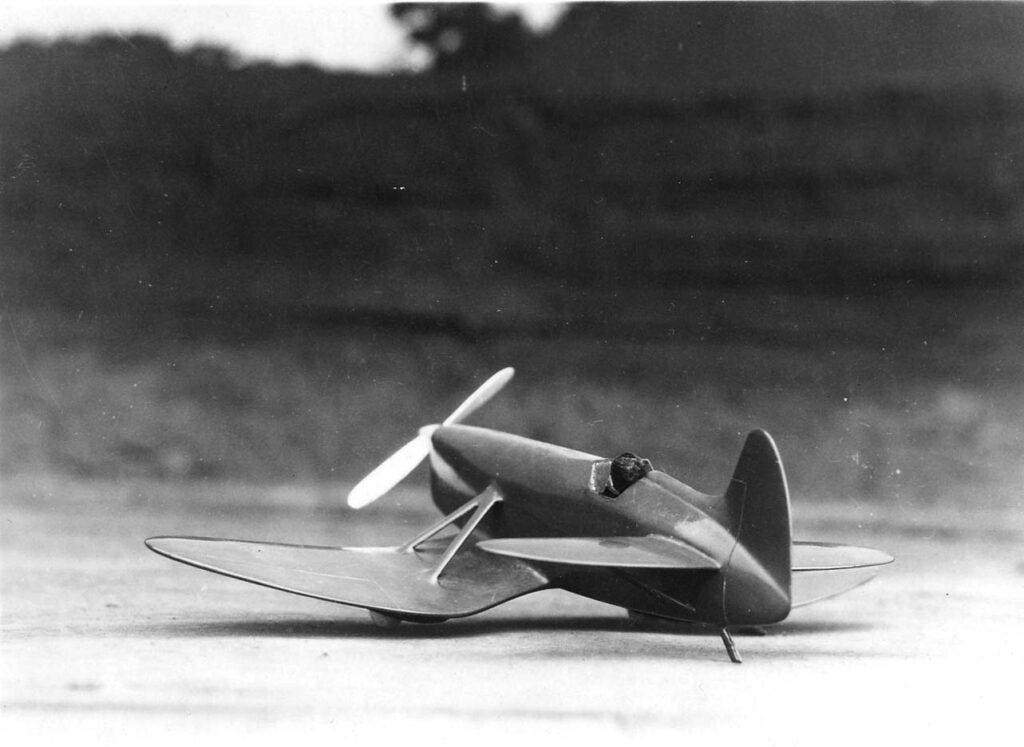 Vintage black and white photograph of the proposed production aircraft model that was designed by Donald Hall, taken on the roof of the old Ryan factory in San Diego, California in 1929.
