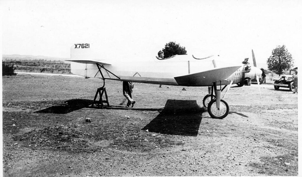 Vintage black and white photograph of the single engine Hall X-1 while on the ground at Camp Kearney, San Diego. Designed by Donald Hall, the engineer of Spirit of St. Louis.