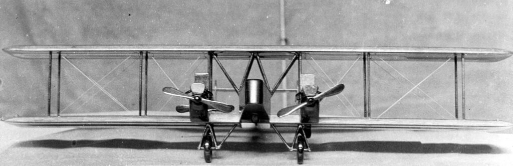 Front view photograph of a wooden model bi-plane bomber designed by Donald Hall.  This vintage design won an award for the designer in Dayton, OH in 1922.