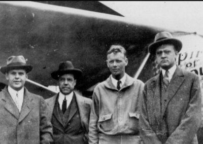 Vintage photograph of Harry Knight, Harold Bixby, and the newsppaper publisher of the Globe-Democrat: Lansing Ray with aviation pilot Charles Lindbergh